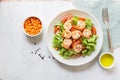 Healthy food shrimp salad lettuce carrot tomato in bowl on wood background Royalty Free Stock Photo