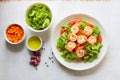 Healthy food shrimp salad lettuce carrot tomato in bowl on wood background Royalty Free Stock Photo