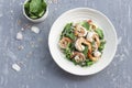 Healthy food shrimp salad has peppermint lemon grass kale in bowl on grey wood background Royalty Free Stock Photo