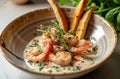 shrimp scampi dish with bread sticks and fresh herbs Royalty Free Stock Photo