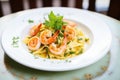 shrimp scampi over pasta with parsley garnish Royalty Free Stock Photo