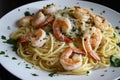 Shrimp Scampi Pasta with a generous portion of juicy shrimp, al dente pasta, and flavorful garlic butter sauce Royalty Free Stock Photo