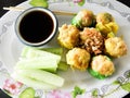 Shrimp shumai.Prawn Siew Mai is a popular Cantonese-style dim sum.Fat prawns wrapped in a thin batter, Royalty Free Stock Photo