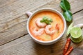 Shrimp soup bowl, seafood soup with shrimps prawns in the restaurant, Traditional thai cuisine spicy shrimp soup curry Thai food,