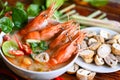 Shrimp soup on seafood soup bowl with thai herb and spices, Thai Food Tom Yum Kung, Hot and sour spicy shrimps prawns soup curry Royalty Free Stock Photo