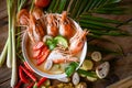 Shrimp soup on seafood soup bowl with thai herb and spices, Thai Food Tom Yum Kung, Hot and sour spicy shrimps prawns soup curry Royalty Free Stock Photo