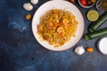 Shrimp Stir Fry with pasta and ingredients, zucchini, lime, cherry tomatoes, garlic and seasonings. With space Royalty Free Stock Photo