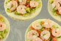 Shrimp tostados on baking sheet Royalty Free Stock Photo