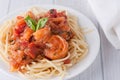 Shrimp in wine tomato sauce over spaghetti pasta Royalty Free Stock Photo