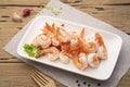 Shrimps, Boiled Prawns in white plate, Shrimp tails ready for cooking