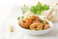 Shrimps with garlic, olive oil and parsley in sherry sauce in a Royalty Free Stock Photo