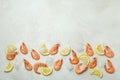 Shrimps, ice cubes and lemon slices on white textured background Royalty Free Stock Photo