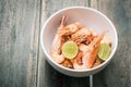 Shrimps and lemon in white bowl Royalty Free Stock Photo