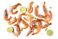 Shrimps with lime and parsley on white background, top flat view. Generative AI Royalty Free Stock Photo