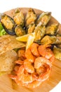 Shrimps, mussels, fish with lemon