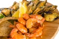 Shrimps, mussels, fish with lemon