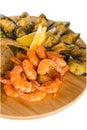 Shrimps, mussels, fish with lemon