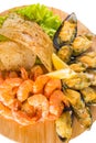 Shrimps, mussels, fish with lemon