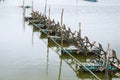 At shrimps pond in the rainy season,and paddle wheel aerator Royalty Free Stock Photo