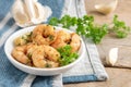 Shrimps or prawns and garlic in olive oil with parsley garnish i Royalty Free Stock Photo