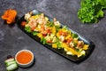 Shrimps salad with Orange, apple, cucumber, tomato and sauce served in dish isolated on grey background top view of indian and Royalty Free Stock Photo