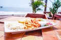 Shrims plate over a wood table in the beach of Masachapa, Managua, Nicaragua. Central America.