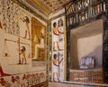 Shrine and end of south wall of a fresco decorated passageway leading to shrine with remains statues Menna and Henut-Tawy in TT69.