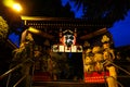 Shrine Gate lighting up and Sacred Sake barrels