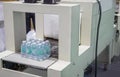 Shrink film wrapping machine