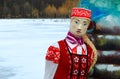 Shrovetide doll in bright folk costume