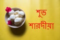 Shubho Sharodiya written in Indian language Bengali meaning Durga Puja greetings. Royalty Free Stock Photo