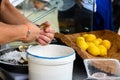 Shucking of Fresh french Gillardeau oysters molluscs on oysters festival in Normandy, france, ready to eat