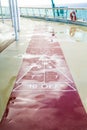 Shuffleboard Court on Wet Deck Royalty Free Stock Photo