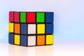 Shuffled Magic Cube for problem-solving on light blue background