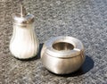 Shugar shaker and ashtray Royalty Free Stock Photo