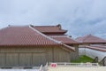 Shuri Castle rampart overlooking Okinawa skyline in Naha, Okinawa, Japan Royalty Free Stock Photo