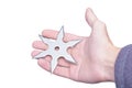 Shuriken in the hand isolate Royalty Free Stock Photo