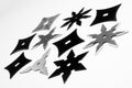 Shurikens on white background