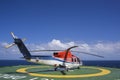 Shut down engine helicopter on oil rig helipad Royalty Free Stock Photo