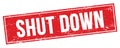 SHUT DOWN text on red grungy rectangle stamp Royalty Free Stock Photo