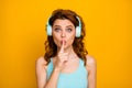 Shut up please. Photo of pretty funny lady listen modern technology youngster headphones favorite song hold finger on