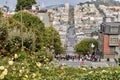 People standing on Lombard street taking pictures