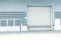 Shutter door or roller door and concrete floor inside factory building Royalty Free Stock Photo
