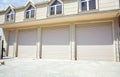 Shutter door or roller door and concrete floor outside .White Automatic shutters in a house . gates in the garage . Automatic Royalty Free Stock Photo