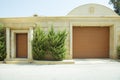 Shutter door or roller door and concrete floor outside .White Automatic shutters in a house . gates in the garage . Automatic Royalty Free Stock Photo