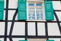 Shuttered window in a German timber frame house Royalty Free Stock Photo