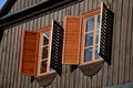 Shutters of an old cottage. protects against sun thieves. holiday building with a 19th century made entirely of wood. the windows