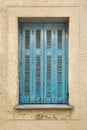 Shutters on wall background. Building exterior of faded wall and shutters. Design in building architecture. Closed Royalty Free Stock Photo