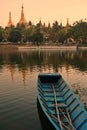 Shwe Dagon Pagoda at sunset, blue boat Royalty Free Stock Photo