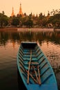 Shwe Dagon Pagoda at sunset, blue boat Royalty Free Stock Photo